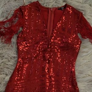 red sparkly fashion nova dress with fringe
